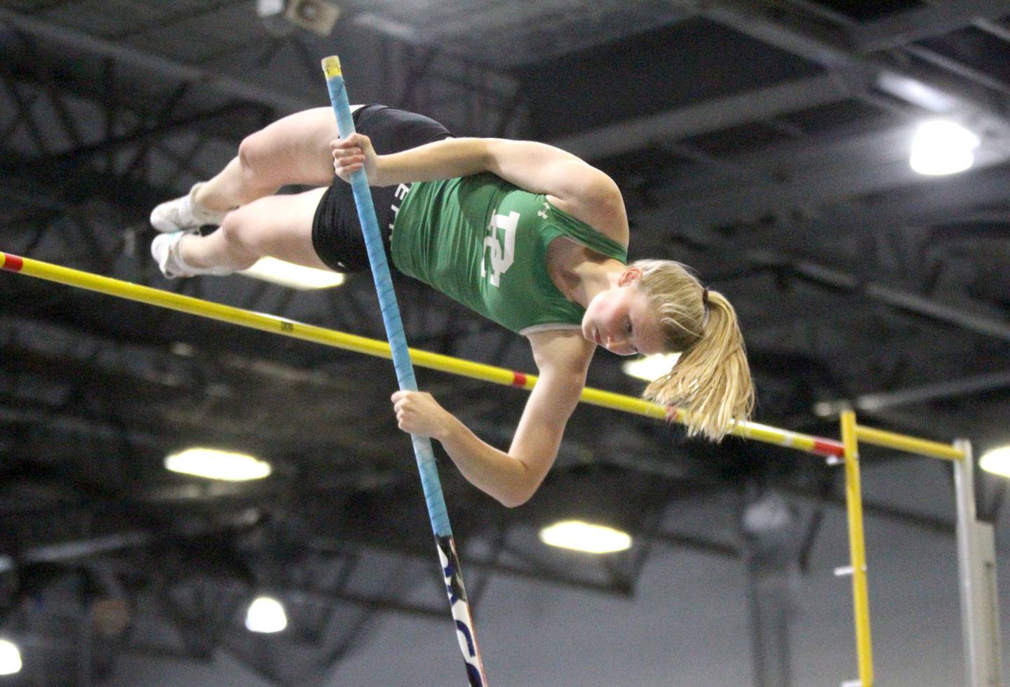 Providence Catholic’s Natalie Papes competes in the 2A pole vault finals during the IHSA Girls State Championships in Charleston on Saturday, May 21, 2022.