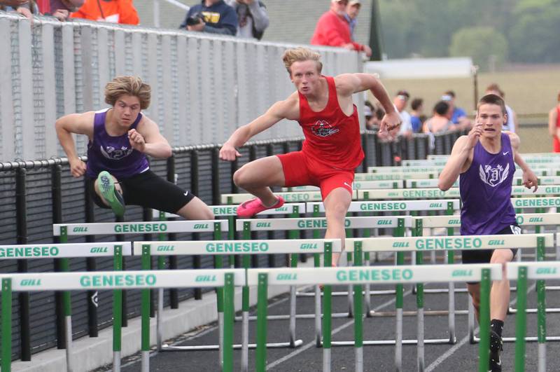 Dixon's Dawson Kemp, Ottawa's Weston Averkamp and Dixon's Cullen Shaner compete in the 110 meter hurdles during the Class 2A track sectional meet on Wednesday, May 17, 2023 at Geneseo High School.