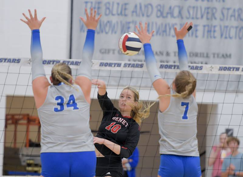 Benet’s Ava Novak (10) hits the ball past St. Charles North's Noelle Nyman (34) and Mia Mccall (7) during a game on Wednesday, September 20, 2023.