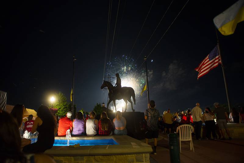 Fireworks light up the sky behind the Reagan statue in Dixon Sunday, July 3, 2022 as the Petunia Fest nears to a close. The day ended with hip-hop group “Too Hype Crew” entertaining a huge crowd.