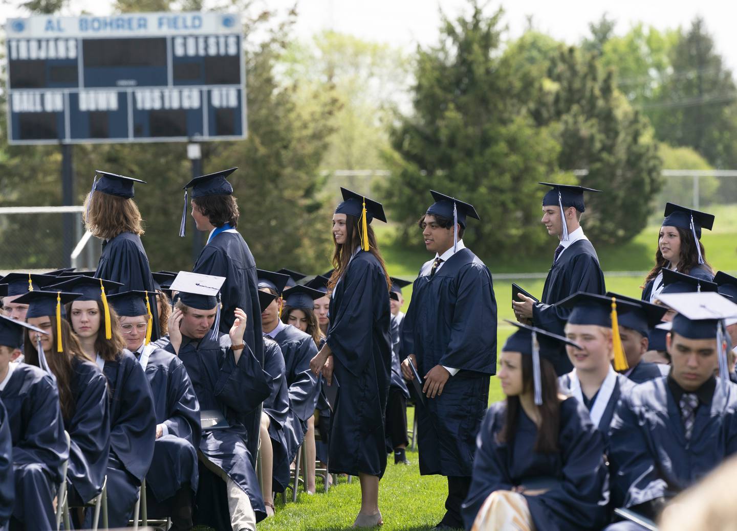Graduates return to their seats after receiving their diplomas during a graduation ceremony for the class of 2022 on Saturday, May 14, 2022, at Cary-Grove High School in Cary.