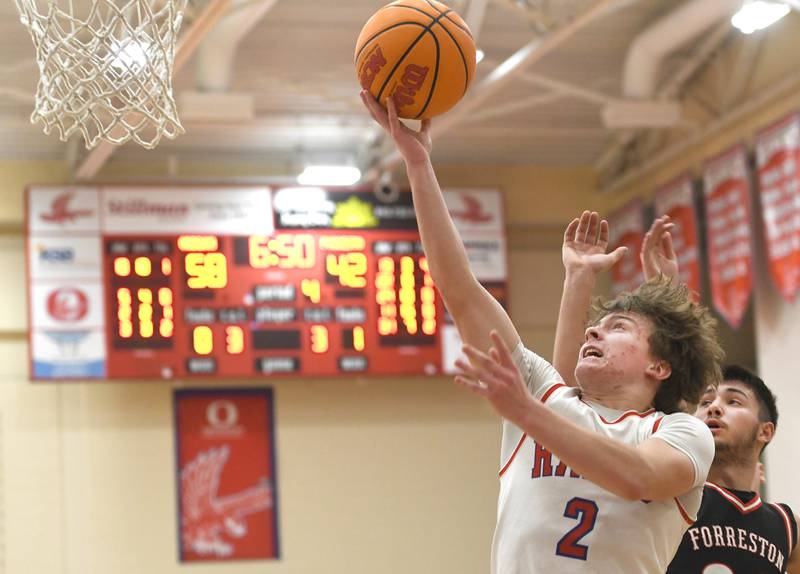 Oregon's Cooper Johnson drives in for a basket against Forreston on Tuesday, Feb. 17, 2026 at the Blackhawk Center in Oregon.