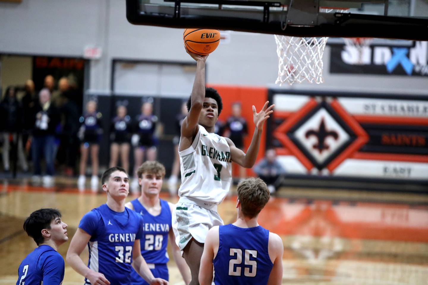 Glenbard West's TJ Williams gets the ball to the basket during the Class 4A St. Charles East Sectional final against Geneva on Friday, March 7, 2025 in St. Charles.