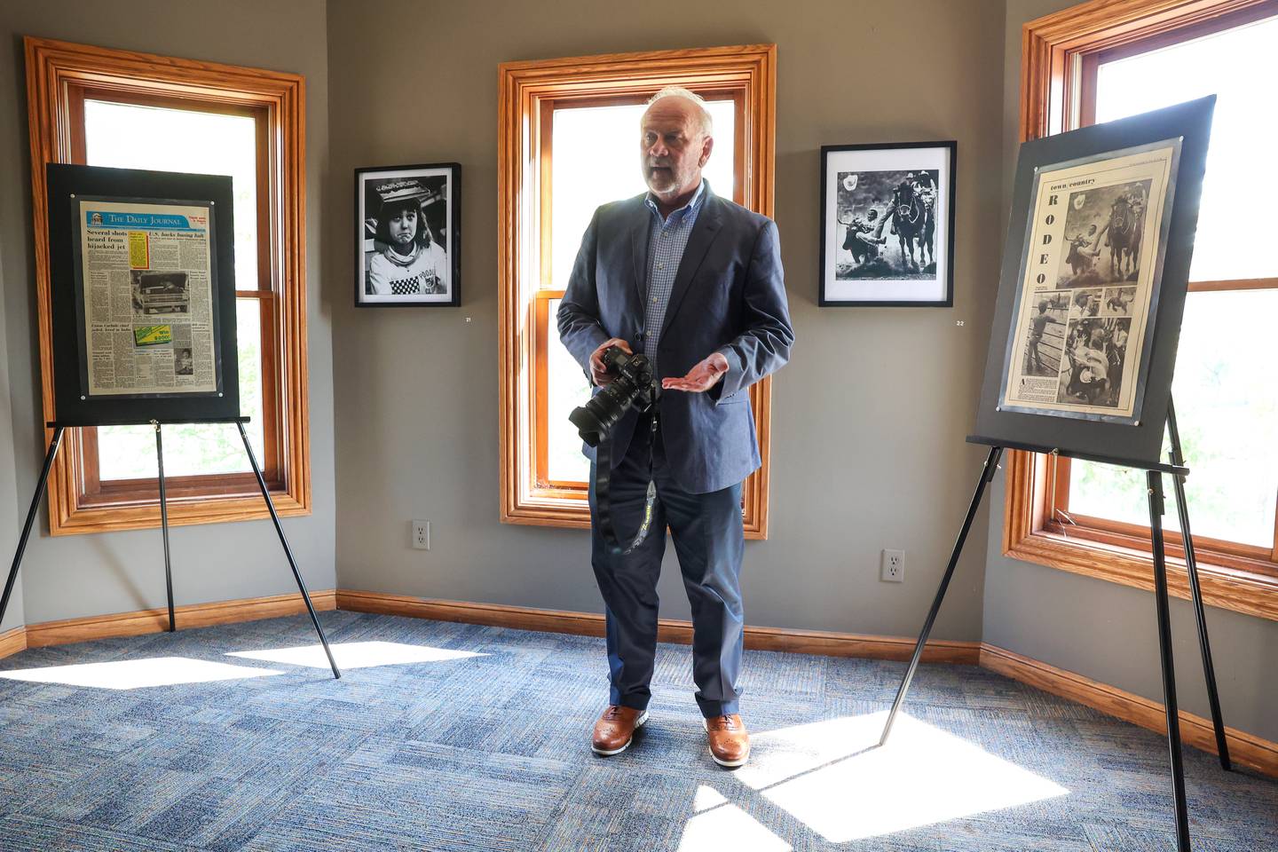 Bill "BJ" Jurevich, a longtime Daily Journal photographer, reflects on photos printed in various issues of the newspaper, which are featured in his new gallery titled, Life Through the Lens: A Photographic Retrospective, which runs through Oct. 25 at the Victorian House Gallery, 577 S. Main Street in Bourbonnais.