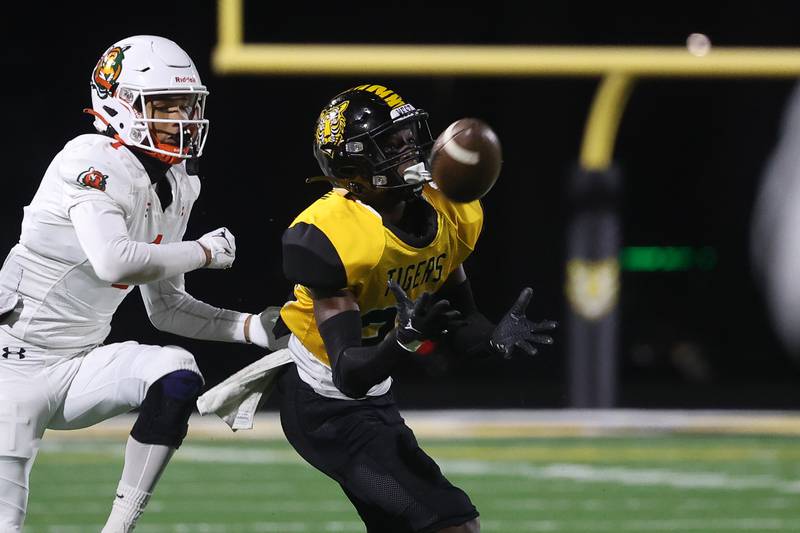 Joliet West defensive back Jalen Johnson intercepts a pass against Plainfield East on Friday, Oct. 13, 2023, in Joliet.