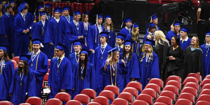 Geneva High School seniors enter the arena for their graduation ceremony on Tuesday, May 30, 2023 at Northern Illinois University in DeKalb.