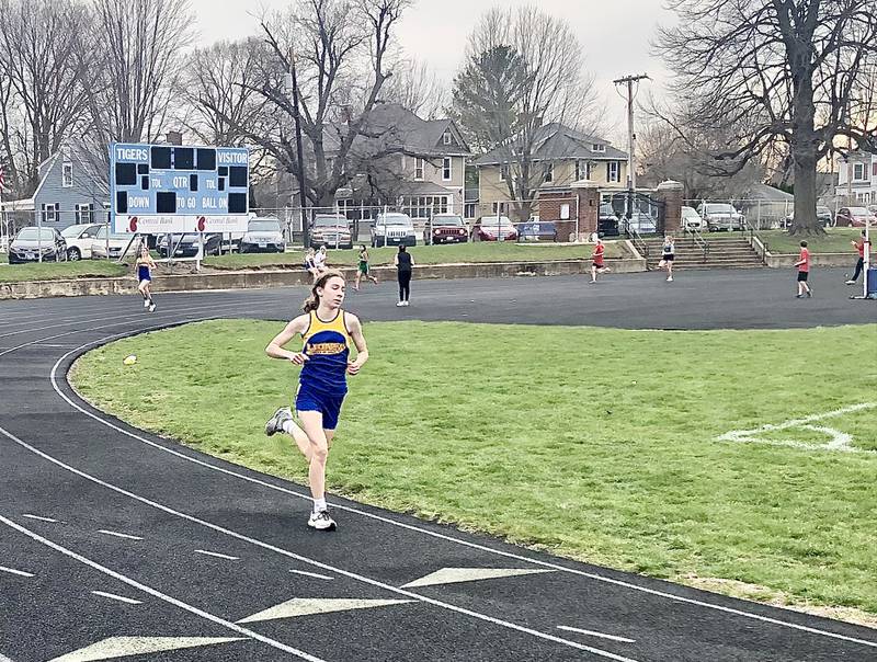 Princeton Logan's Ruby Acker runs away in the seventh-grade 400m dash Monday at PHS' Rathje Track.