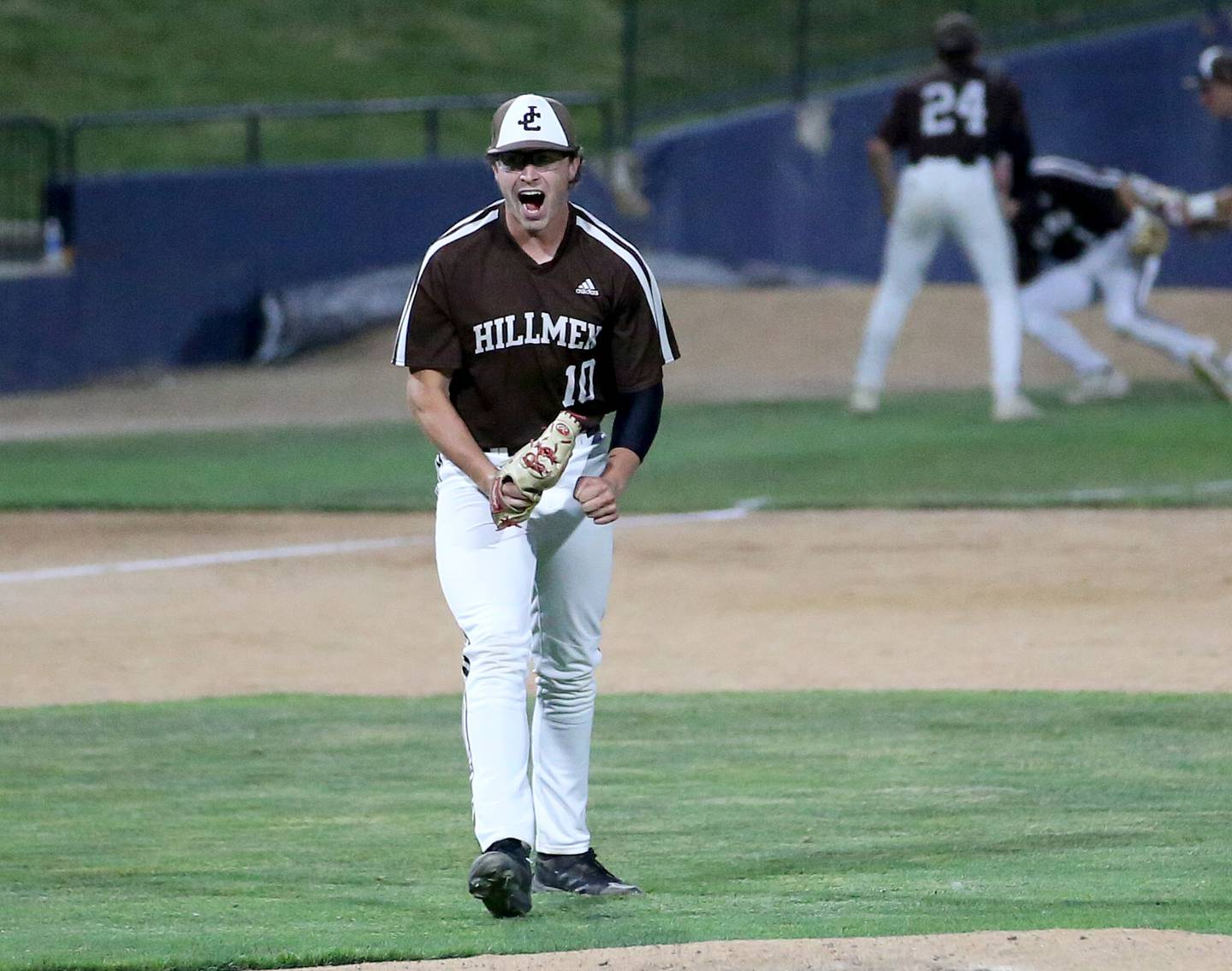 Joliet Catholic pitcher T.J. Schlageter reacts after defeating Quincy Notre Dame in the Class 2A State Semifinal game on Friday, June 2, 2023 at Dozer Park in Peoria.