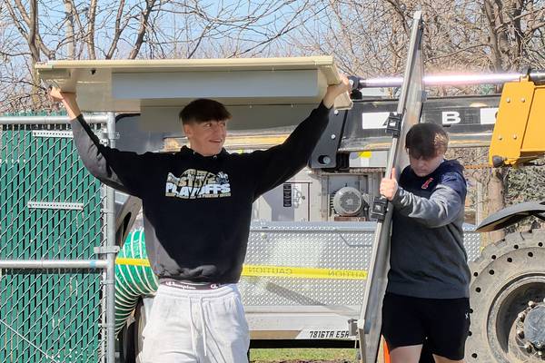 Bishop McNamara students, families come together in storm cleanup, relief