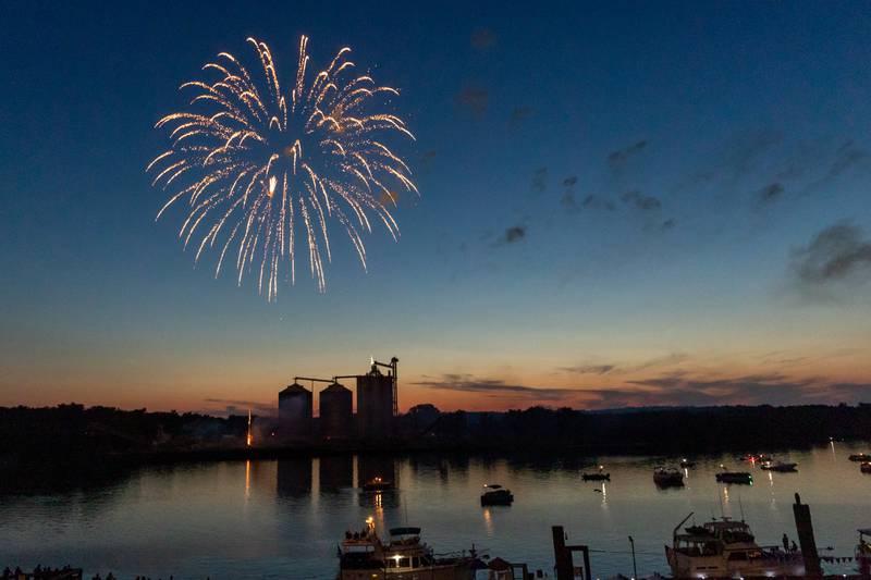 Fireworks display over silos at the annual 4th of July firework show on Friday, July 4, 2025 at River Front Park in Hennepin.