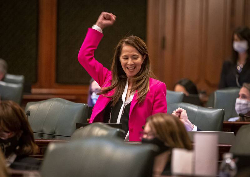 Illinois State Rep. Jennifer Gong-Gershowitz, D-Glenview, celebrates the passage of House Bill 367, a bill that requires public schools teach Asian American history, on the floor of the Illinois House of Representatives on the last day of session at the Illinois State Capitol in Springfield, Ill., Monday, May 31, 2021. (Justin L. Fowler/The State Journal-Register via AP)