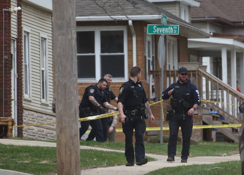 Police secure the scene of a two-story apartment building on the corner of Seventh and Charters on Sunday, March 30, 2025 in La Salle. A barricaded armed subject fired shots at officers. Police from across the Illinois Valley assisted in the incident.