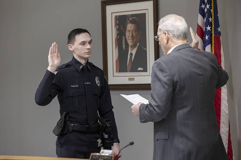 New Dixon Police Officer Christian Yepsen is sworn in Monday, Feb. 2, 2026, by Dixon Mayor Glen Hughes.