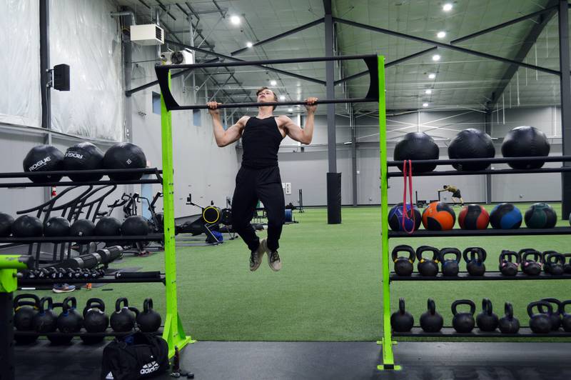 Jared Schneider, of Sterling, does pull-ups at Westwood Fitness & Sports Center on Tuesday, Nov. 21, 2023. Westwood is one of the Sterling Park District's many parks and facilities.
