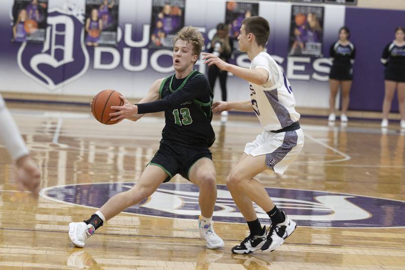 Rock Falls’ Aydan Goff handles the ball against Dixon Tuesday, Feb. 7, 2023.