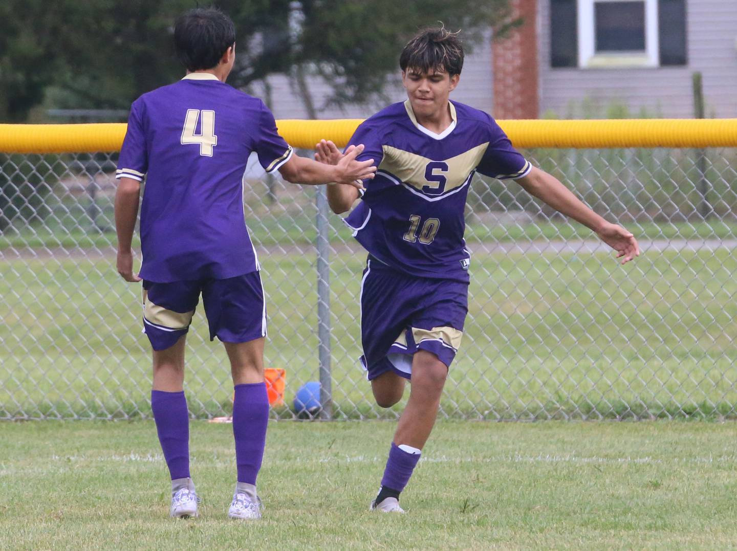 Serena's Justin Delgado, hi-fives teammate Joey Tuftie, after scoring a goal against Earlville on Wednesday, Sept. 3, 2025 at Serena High School.