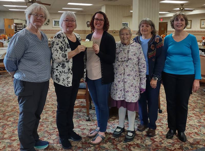 (Left to right); St. Paul’s Episcopal Church Women members Jennie Cummings, Peggy Newby, Barb City Manor executive director Sarah Davis, group members Pat Brown, Jocelyn Prall, and Maureen Gerrity