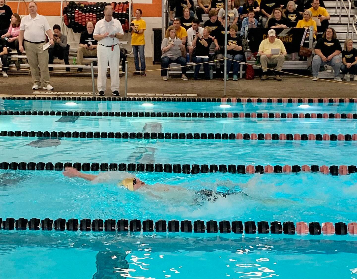 Sterling senior Hunter Lofgren competes in the 100-yard backstroke at the United Township Sectional on Saturday, Feb. 18, 2023 in East Moline.
