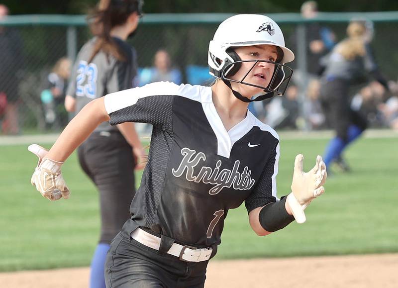 Kaneland's Kailey Plank heads for third during their Class 3A Regional game against Woodstock Tuesday, May 24, 2022, at Kaneland High School in Maple Park.