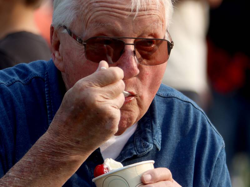 Harold Petterson of Vernon Hills, digs into a treat Friday, Aug. 18, 2023, during Julie Ann’s first-ever Ice Cream Fest at Crystal Lake’s Main Beach.