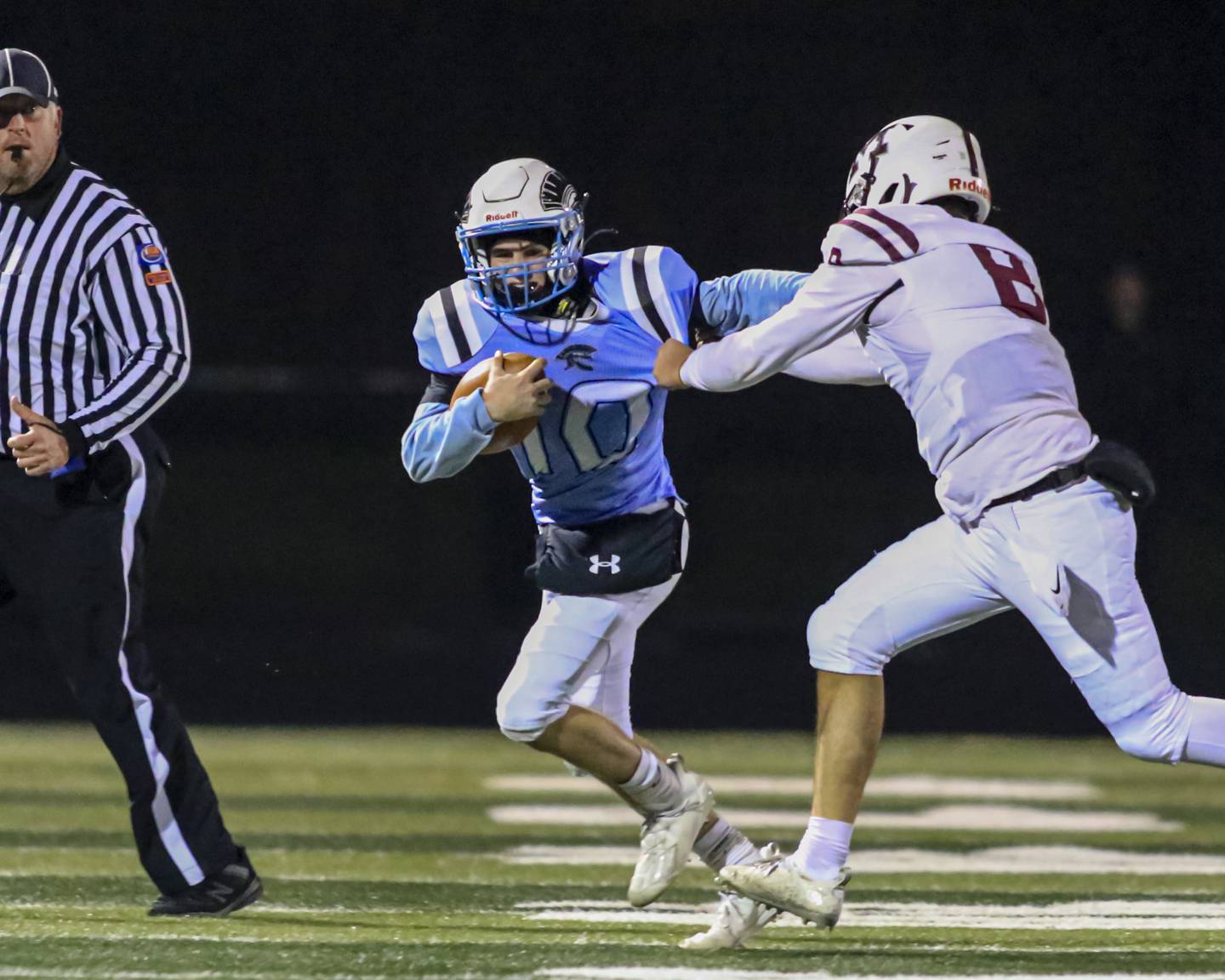 Willowbrook's Joseph Tumilty (10) runs back an interception during Class 7A second-round game between Moline at Willowbrook