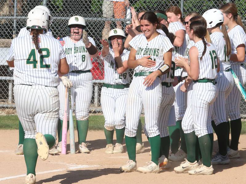 St. Bede's Ava Balestri is greeted by teammates at home plate after hitting a home run against Dwight on Friday, May 15, 2026 at St. Bede Academy.