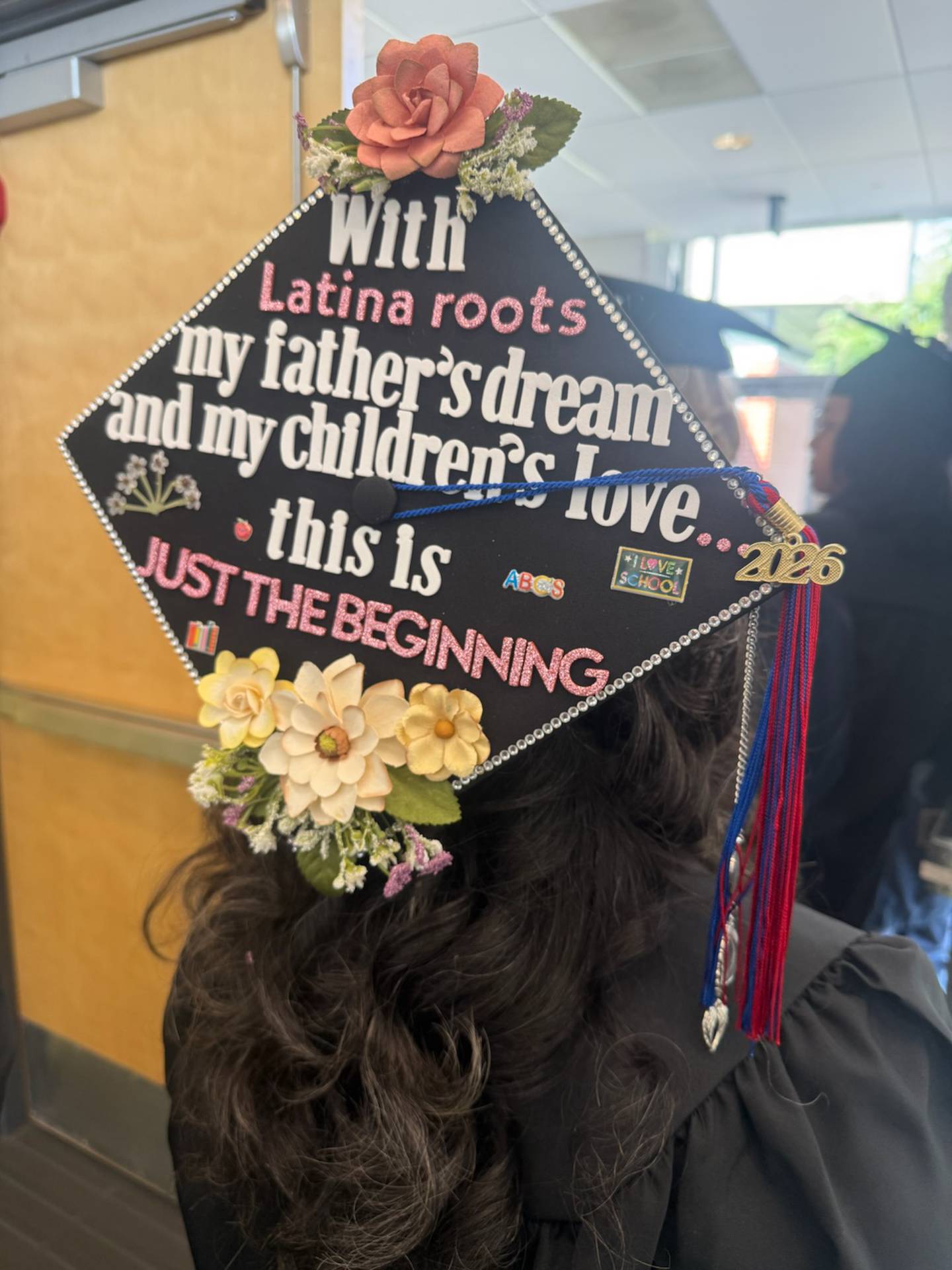 Mireya Leal Resendiz, who graduated from Kankakee Community College at the same time as her son, decorated her cap to read, "With Latina roots, my father's dream and my children's love - this is just the beginning."