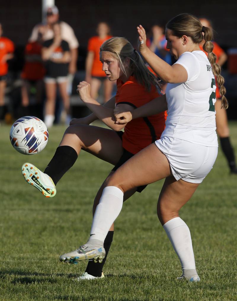 Crystal Lake Central's Brooklyn Carlson tries to take a shot on goal as she is defended by Boylan's Emma Ambrose during the IHSA Class 2A Burlington Central Girls Soccer Sectional final match Friday, May 26, 2023, at Burlington Central High School.