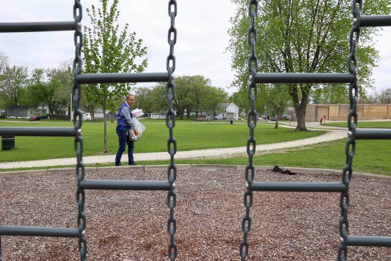 Volunteer Wayne Bisaillon, with Dow Chemical in Kankakee, cleans up Washington Park during the United Way of Kankakee & Iroquois Counties’ annual Day of Action on Wednesday, April 22, 2026.