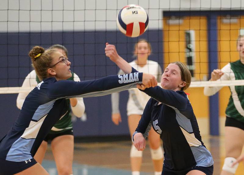 Bureau Valley's Emma Stabler and Kate Salisbury hit the ball to the St. Bede side of the net on Tuesday, Sept. 5, 2023 at Bureau Valley High School.