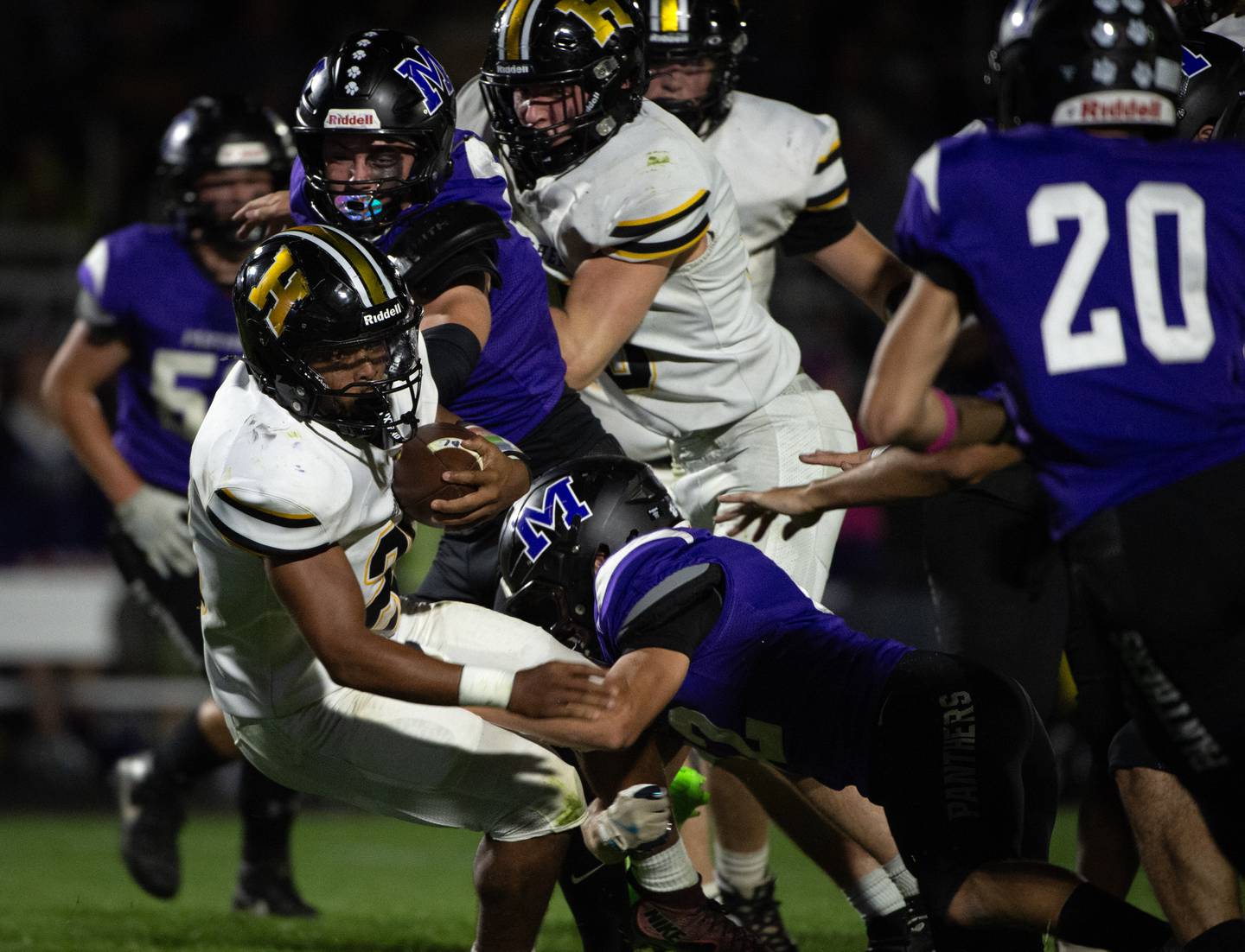 Herscher's Aleksander Draper, left, carries the ball and is brought down by Manteno's Carter Stell in a game on Friday, September 12, 2025.