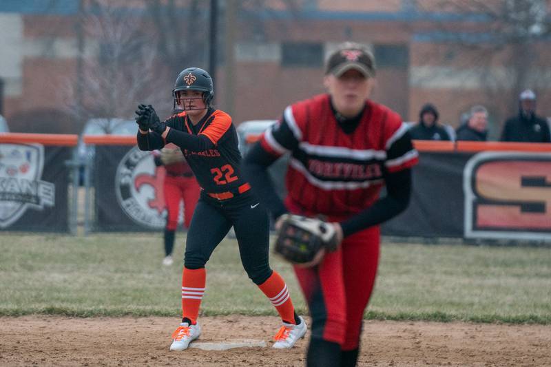 St.Charles East's  Brianna Risley (22) take a lead-off on second against Yorkville during a softball game at St.Charles East High School on Wednesday, Mar 22, 2023.