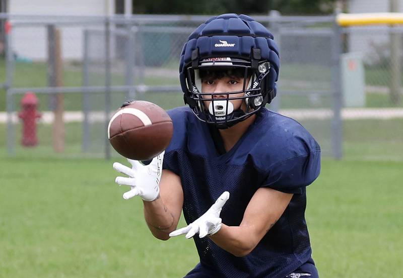 Hiawatha’s Issac Ramangkoun looks in a pass Tuesday, Aug. 19, 2025, during practice at the school in Kirkland.