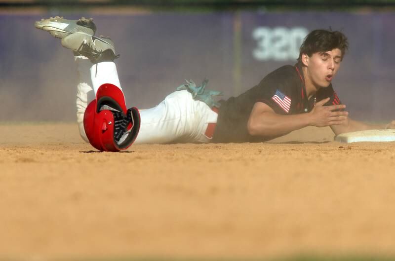Barrington’s John Albrecht reacts after being called out at second base against Huntley in sectional semifinal baseball action at Hampshire Wednesday.