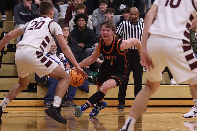 Lincoln-Way West’s Max Gabriel finds an opening to the paint against Lockport on Friday, Dec. 6, 2024 in Lockport.
