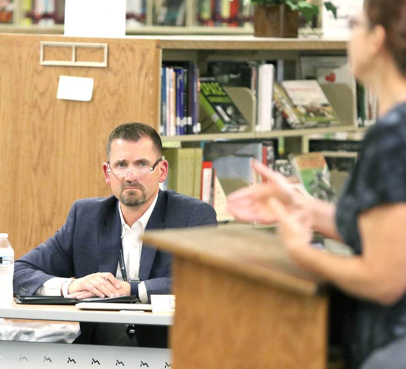 Sycamore School District 427 Superintendent Steve Wilder listens to a speaker who is asking that the board not require students to wear masks when they return in the fall. A group of parents were in attendance Tuesday at the meeting at Sycamore High School requesting that the board make mask wearing optional for students in the district.