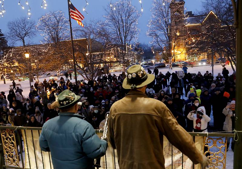 Polka music is sung by members of Die Musik Meisters to entertains the crowd before Woodstock Willie makes his prognostication Wednesday, Feb, 2, 2022, during the annual Groundhog Day Prognostication on the Woodstock Square. This is the 30th anniversary of when the movie “Groundhogs Day” was filmed in Woodstock.