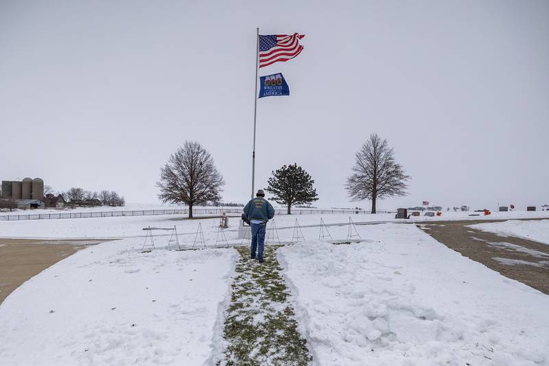 Dennis Moss places the first wreath Saturday, Dec. 13, 2025, in a Wreaths Across America ceremony in Dixon. The wreath represents the United States Army. Each branch received a commemorative wreath in the ceremony.