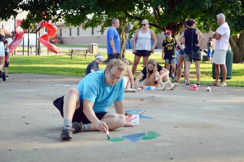 Jackson Van Brocklin, of Forreston, Paints the Park on Friday, Aug. 2, 2024, during Forreston Sauerkraut Days.