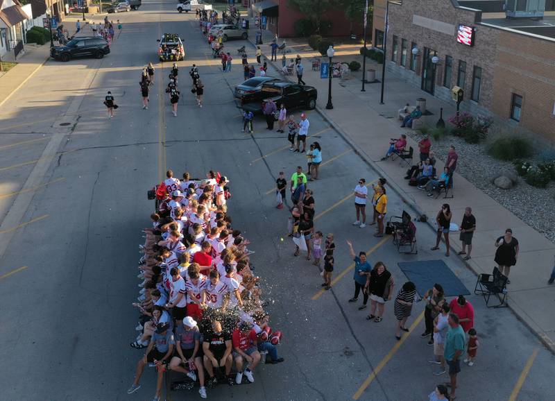 Members of the Hall-Putnam County football team ride on a float during the inaugural Homecoming parade on Wednesday, Sept. 17, 2025 down McCoy Street in Granville.