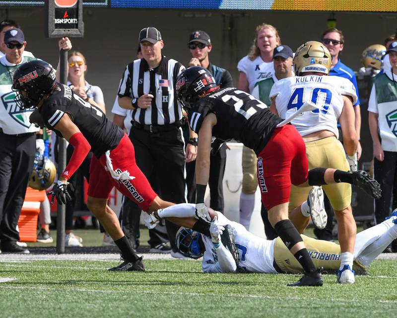 Northern Illinois University Davis Patterson runs the ball before being brought down during the second half of the game on Saturday Sep.23, 2023, while taking on Tulsa University in DeKalb.