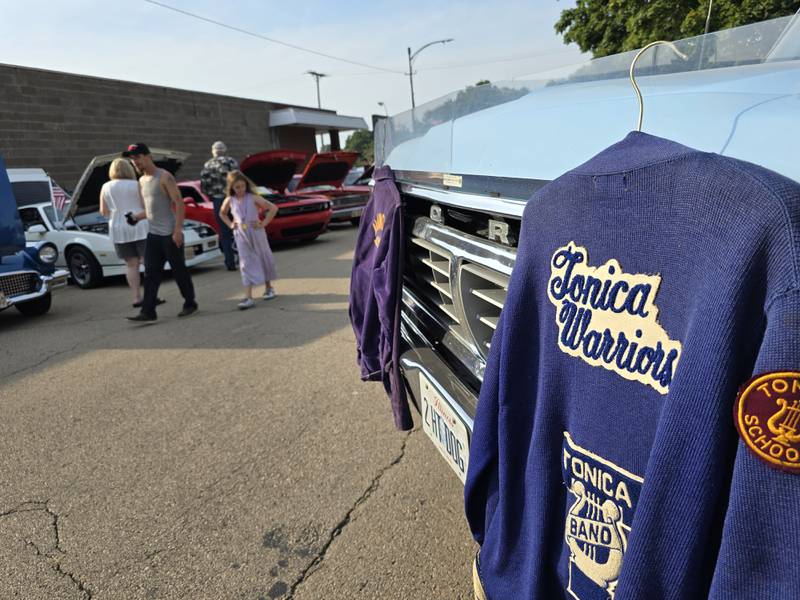 A Tonica Warriors jacket hangs from a classic Ford truck Saturday, Aug. 24, 2024, during the Tonica Fest car show.