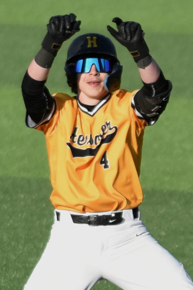 Herscher's Brock Berns gestures towards the Tigers dugout after his go-ahead double during a home game against Coal City Monday, April 20, 2026.
