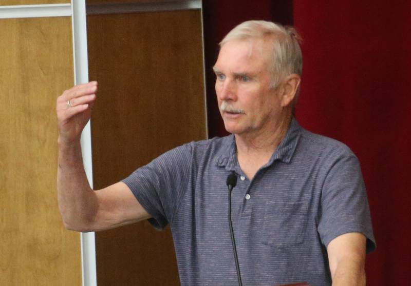 Paul Youngstrum speaks to the Illinois Health Facilities and Services Review Board during a public hearing regarding OSF St. Elizabeth Hospital's plans to reduce services on Tuesday, June 10, at Central Intermediate School in Ottawa.