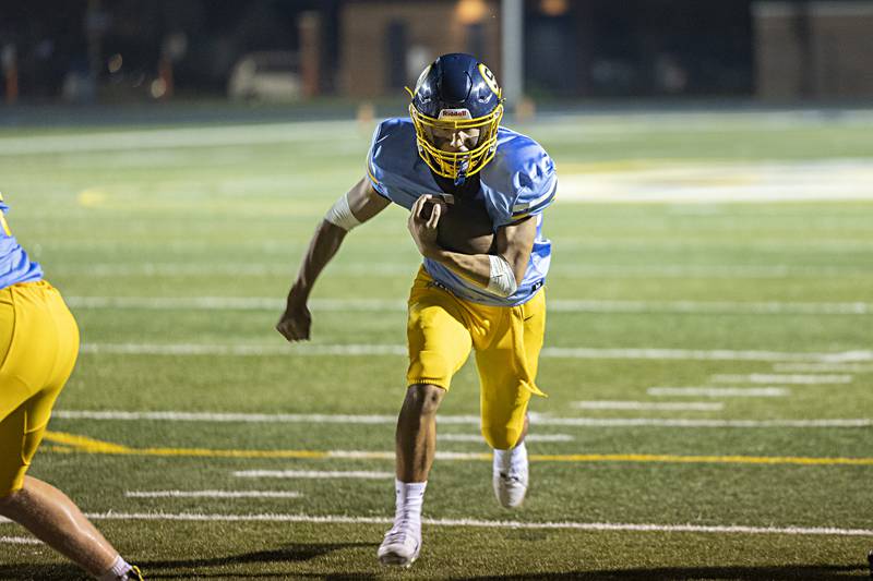 Sterling’s Joseph Holcomb punches it in for a score against Galesburg Thursday, Sept. 14, 2023 at Sterling High School.