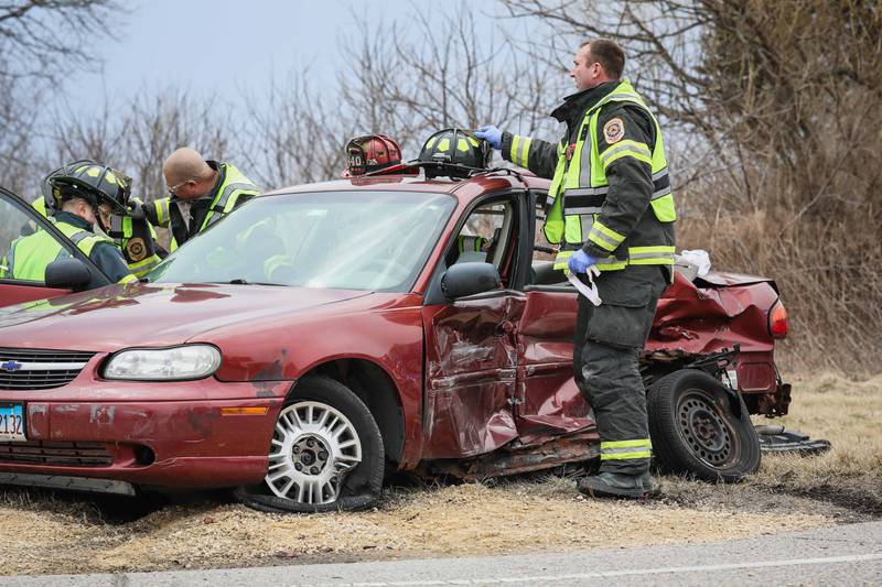 Woodstock Fire/Rescue District firefighters extricated the sedan driver within 10 minutes after a crash with a semi-truck on Thursday, March 27, 2025 at the intersection of Route 120 and North Queen Anne Road in Woodstock.