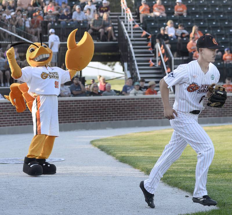 SouthClaw Sam, the Illinois Valley Pistol Shrimp mascot, revs up the crowd Friday, June 2, 2023, at Schweickert Stadium at Veterans Park in Peru as players are introduced during the team's home opener.