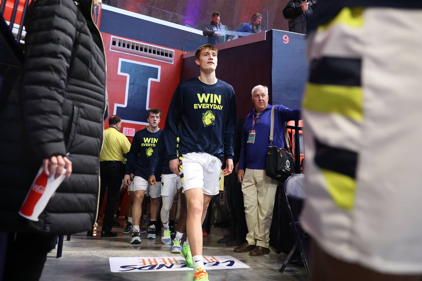 Yorkville Christian’s Jaden Schutt and the rest of the Mustangs enter the arena against Liberty in the Class 1A championship game at State Farm Center in Champaign. Friday, Mar. 11, 2022, in Champaign.