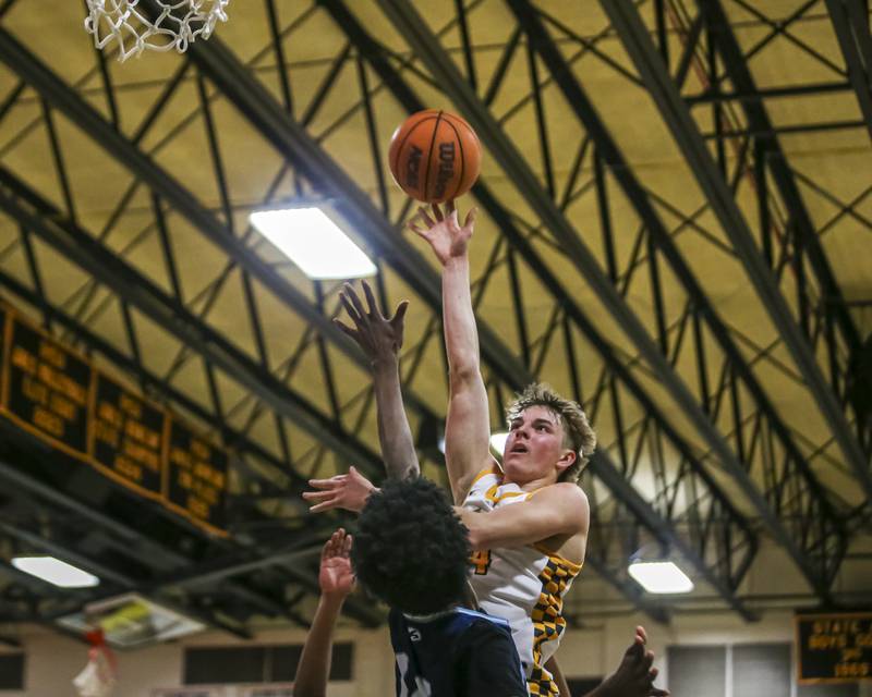 Joliet West's Ryan Lipke (24) puts up a one handed shot a the basket during their basketball game between Plainfield South at Joliet West, Feb 2, 2026 in Joliet.