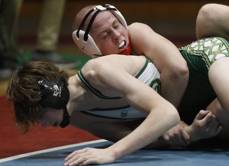 Marian Central's Charlie Fitzgerald controls  St. Patrick's Van Grasser in their 145-pound wrestling match Thursday, Jan. 19, 2023, at Marian Central High School in Woodstock.